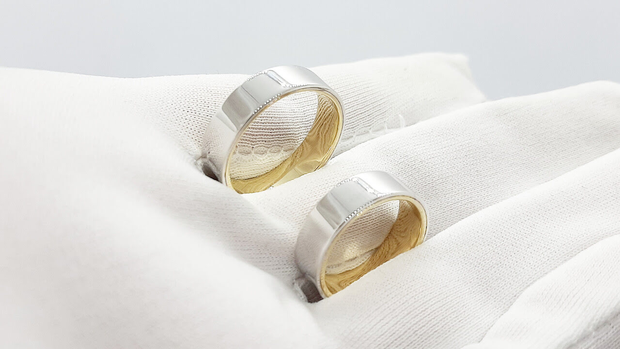 Парные обручальные кольца из комбинированного золота