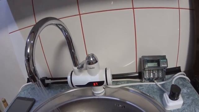 КРАН СМЕСИТЕЛЬ с ПРОТОЧНЫМ ПОДОГРЕВОМ ВОДЫ