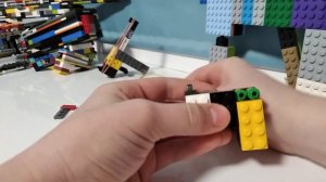 как сделать пистолет из лего который ты сможешь сделать сам ,он стреляет !