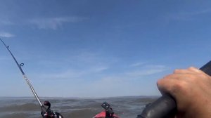 man alone in kayak Vs the Carmarthen bay Sandbar