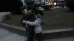 Российский солдат и ребенок. Russian soldier in Crimea and a child.
