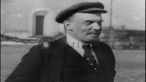 Vladimir Lenin talks to his secretary Vladimir Bonch-Bruevich besides large canno...HD Stock Footag