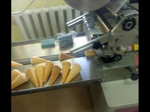 Упаковка вафельных стаканчиков на горизонтальном упаковочном автомате MAGIKON 250AGD