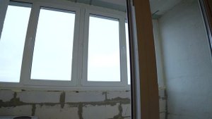 Остекление балкона с дополнительной выкладкой парапета от компании Окна Под Ключ