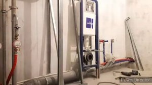 короб из гипсокартона под инсталляция и трубами.