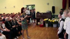 "У моей России длинные косички" в исполнении хора младших классов