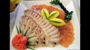 Красивая нарезка рыбы на тарелке. Праздничное оформление нарезки