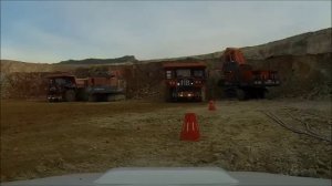 HITACHI EX3600-6 and EX5600E-6 Giant Excavators loading HITACHI EH4000AC-3 Dump Trucks