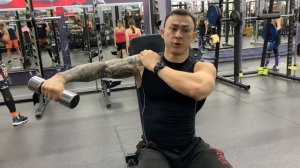 Разводка гантелей через стороны сидя