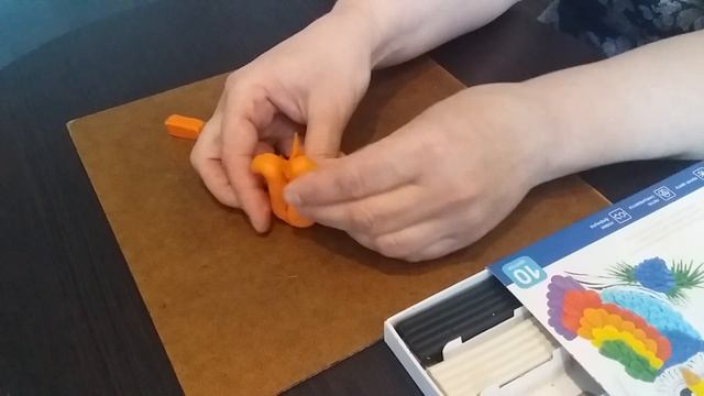 Лепка в старшей группе «Белочка грызёт орешки»