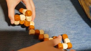 Как собрать деревянную змейку-рубик