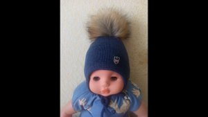 Детская вязаная шапочка с ушками на однофантурной вязальной машине.