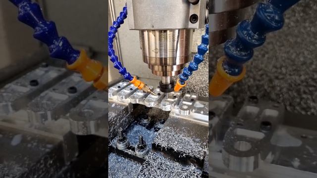 Chamfering 7 parts at once using a custom fixture and  a fusion360 CAM pattern.