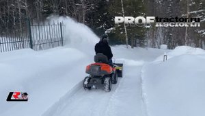 Уборка снега садовым минитрактором Husqvarna R316 TX AWD снегоуборщиком.mp4