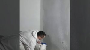 Нанесения шпаклевки на стену хопером от Graco