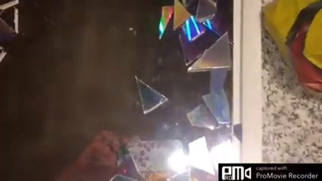 Зеркало оформленное мозаикой из дисков.