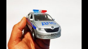 Полицейская машина Skoda Rapid/Шкода Рапид распаковка и обзор.Про машинки.
