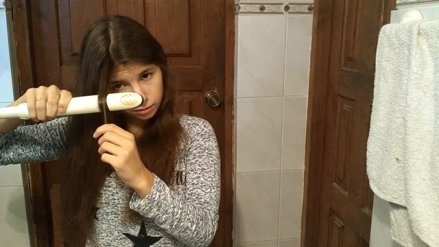 Как сделать кудри с помощью выпрямителя?
