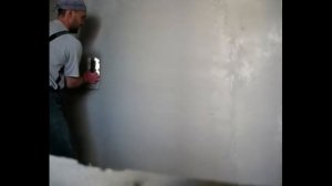 Процесс штукатурки без маяков