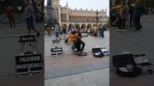 Fantastic Street guitarist Imad Fare plaing in Rynek Glowny Place of Krakow