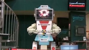 Роботы Kawasaki собирают кубик Рубика на выставке