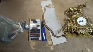 Реставрация чистка антикварных каминных часов и постамента из оникса в мастерской "Три Художника"