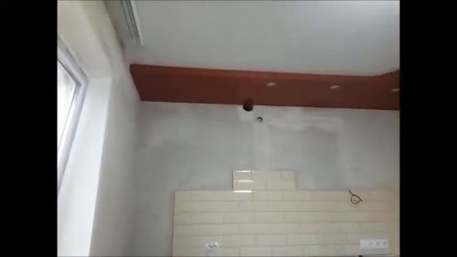 Двухуровневый натяжной потолок на кухне