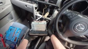 Mazda Axela 2004 head unit stereo removal
