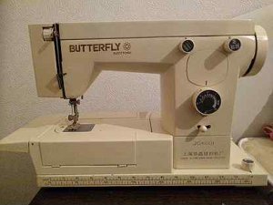 Butterfly JG 6001. Китайская бытовая машина с ротационным промышленным челночным.