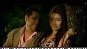 KARAKASH KLIP ORHAN GENJEBAI VE SIBEL JAN.mpg