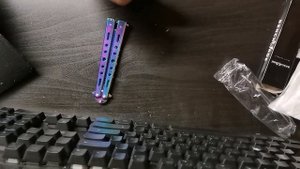 Новая рубрика "AliExpress" расчёска в виде "нож бабочка"