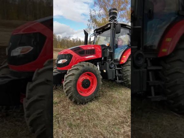 Новый трактор на пахоте!
