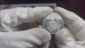 50 тенге 2006 года "Национальные обряды - Бесікке салу", Казахстан Укладывающая в колыбель ребенка.