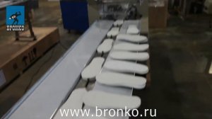 Упаковка тапочек. Горизонтально упаковочная машина ALD 450D