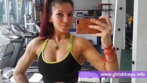 Corina(14) - Young muscle girl with biceps