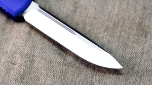 Обзор китайской копии фронтальной выкидухи Microtech Ultratech