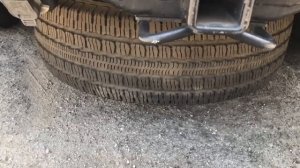 How to remove spare tire on a 2002 Chevrolet Trailblazer