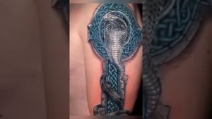 Татуировки: Буда.кобра с крестом.птица феникс.ангел :