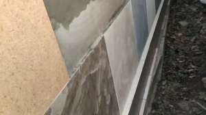 @0308 Оклеивание керамогранитом забора из пеноблоков.