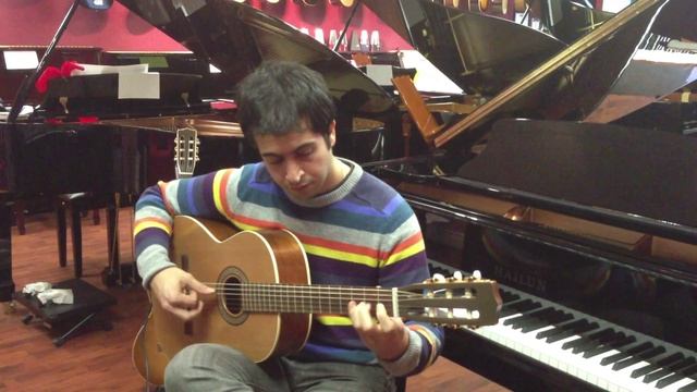 Nader Khaledi Playing Guitar at the Music Gallery смотреть онлайн