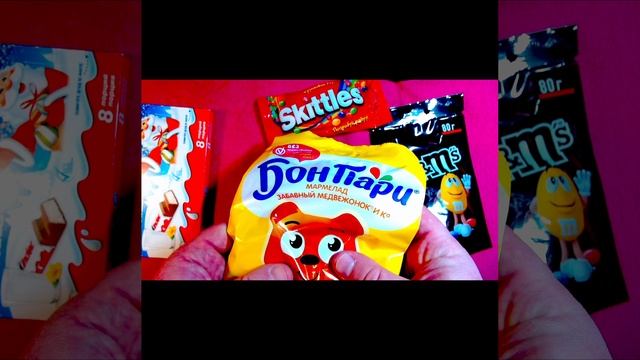 Candy's ASMR lollipops satisfying video relaxing M&Ms Kinder Oreo Skittles Twix Mars #shorts  (2)