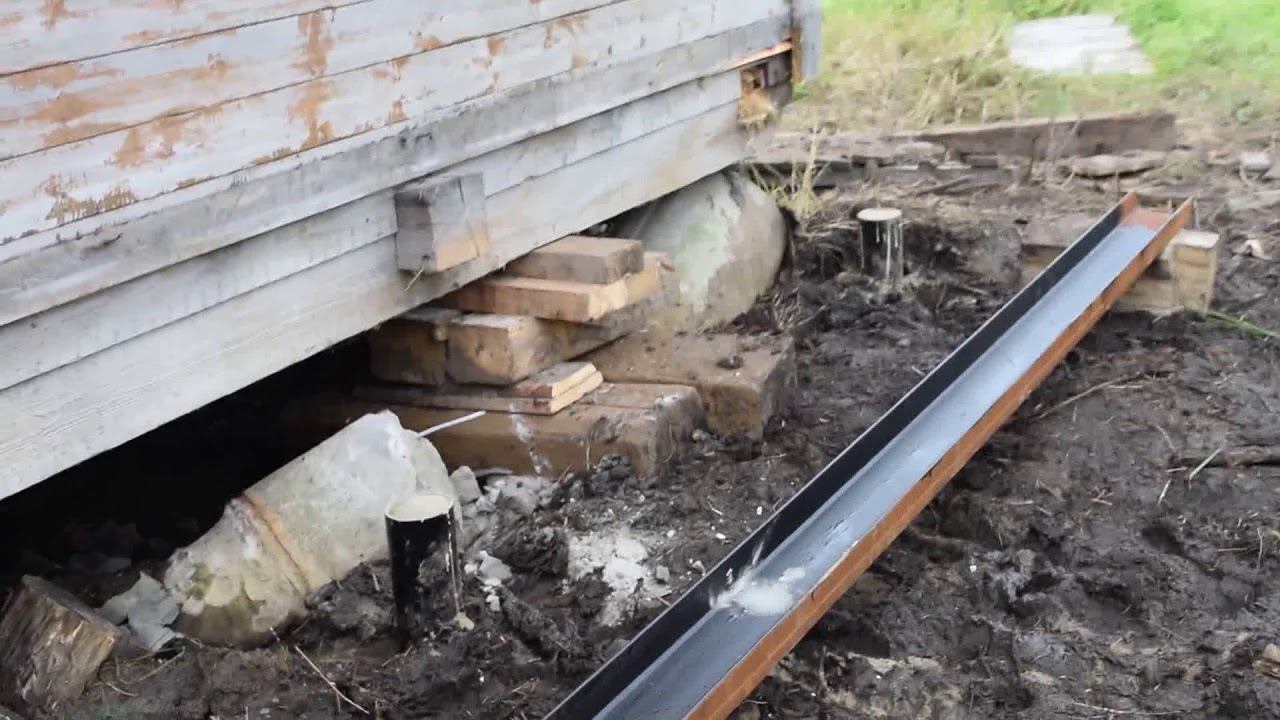 Подъем дома на винтовые сваи в Архангельской обл