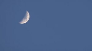 Sony HX20V Zooming in on the Moon and a plane