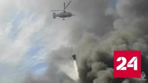 Два вертолета тушат пожар на складе покрышек в Дзержинском - Россия 24 
