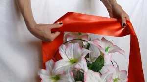 Как закрепить траурную ленту на корзине (часть 1)