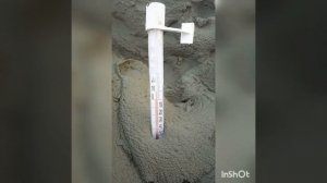 Измерение температуры раствора для кирпичной кладки.Раствор для кладки.Зимняя кладка стен.