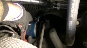 Should you tighten the oil filter by hand or with the wrench?