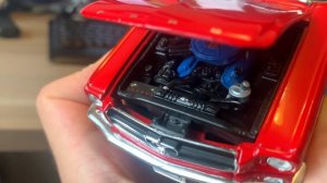 Обзор модели Ford Mustang 1964 в 1:24 от Welly