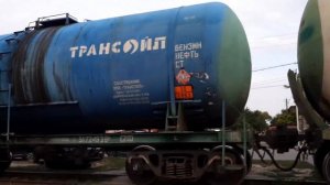 Товарный поезд и тепловоз ЧМЗЭ 2673. Город Ейск, Краснодарский край.