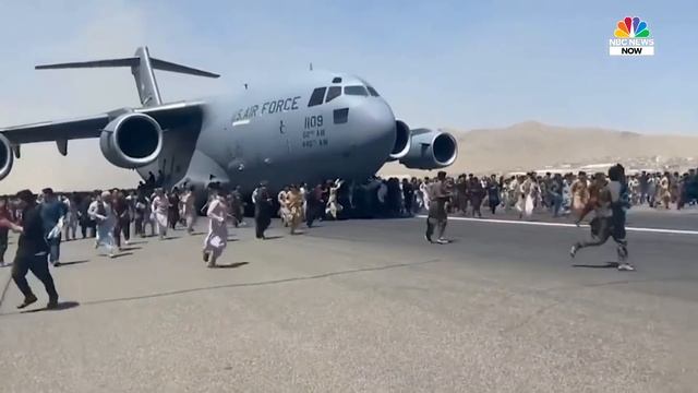 Watch: Afghans Run Alongside U.S. Military Plane At Kabul Airport